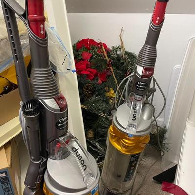 Two Used Dyson Vacuum Cleaners