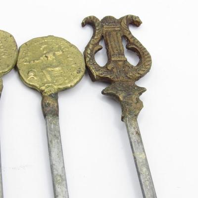 Vintage Brass Mid Century Metal Shish Kabob Presentation Skewers Axe Head, Trident, Coins, & More