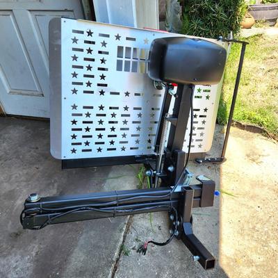 Lot #247  PRIDE GO GO scooter - like new - also has motorized car carrier