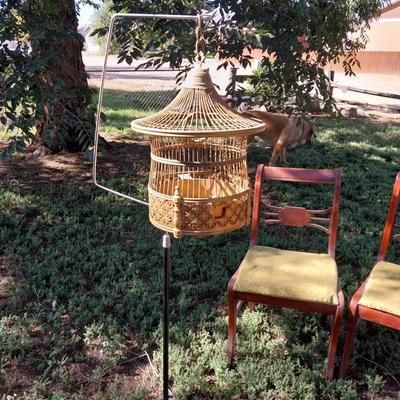 4 VINTAGE DINING CHAIRS, CARVED WOODEN TRUNK, BIRD CAGE ON A POLE AND 2 LAMPS