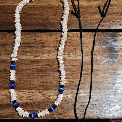 Aa: Hematite Eagle Pendant Necklace and Puka Shell Necklace