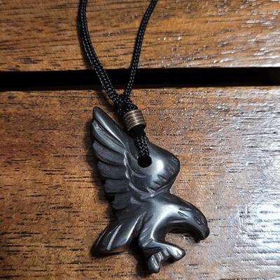 Aa: Hematite Eagle Pendant Necklace and Puka Shell Necklace
