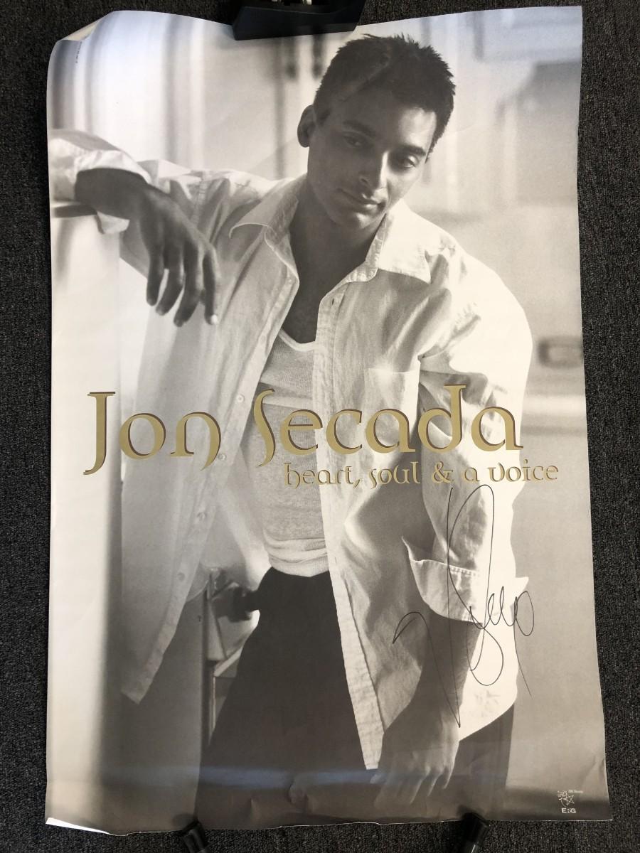 Secada Face Jon Secada signed poster | EstateSales.org