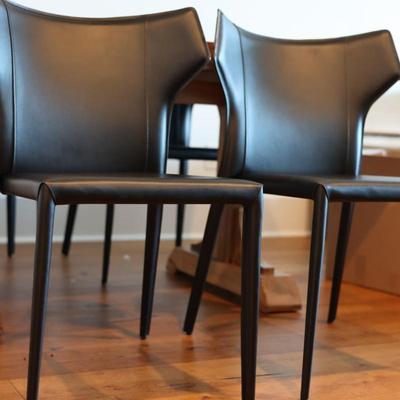 Two Leather Wing Back Side Chairs - From Eclectic Homes