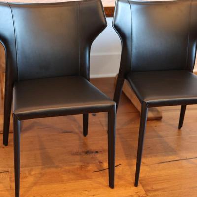 Two Leather Wing Back Side Chairs - From Eclectic Homes