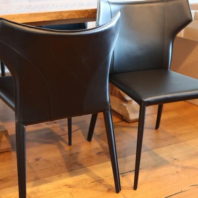 Two Leather Wing Back Side Chairs - From Eclectic Homes