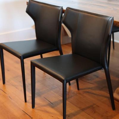 Two Leather Wing Back Side Chairs - From Eclectic Homes