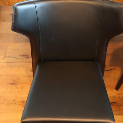 Two Leather Wing Back Side Chairs - From Eclectic Homes