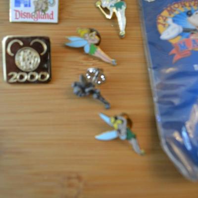 LOT 99. DISNEY PINS