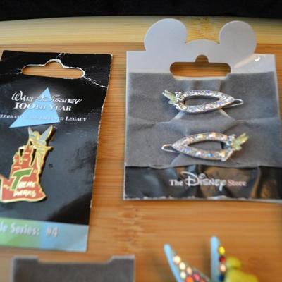 LOT 104. DISNEY PINS