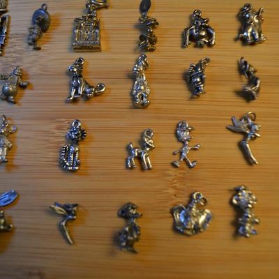 LOT 106. DISNEY CHARMS