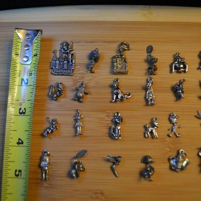 LOT 106. DISNEY CHARMS