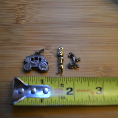 LOT 107 WAGON TRAIN AND MISC. CHARMS