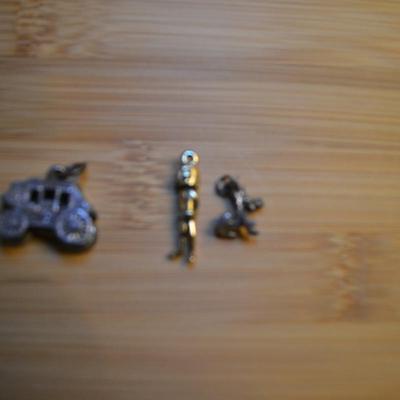 LOT 107 WAGON TRAIN AND MISC. CHARMS