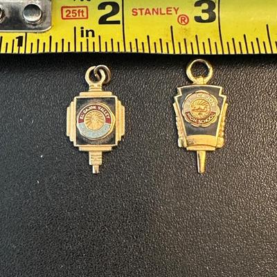 LOT 136. VINTAGE EL CAJON HIGH SCHOOL CHARMS