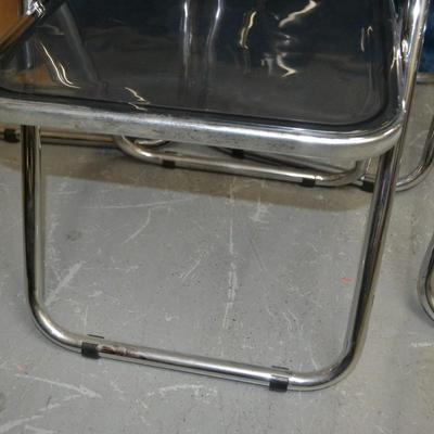 LOT 148 THREE ACRYLIC FOLDING CHAIRS AND ONE FRAME BY ALSTON QUALITY INDUSTRIES MADE IN ITALY