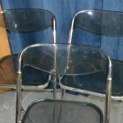 LOT 148 THREE ACRYLIC FOLDING CHAIRS AND ONE FRAME BY ALSTON QUALITY INDUSTRIES MADE IN ITALY