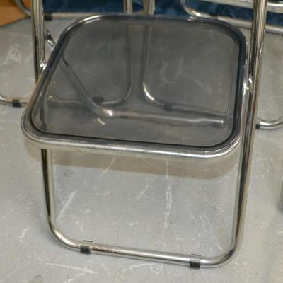 LOT 148 THREE ACRYLIC FOLDING CHAIRS AND ONE FRAME BY ALSTON QUALITY INDUSTRIES MADE IN ITALY