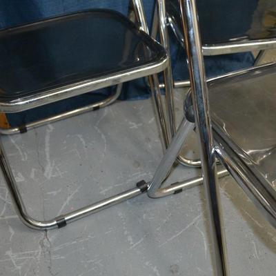 LOT 148 THREE ACRYLIC FOLDING CHAIRS AND ONE FRAME BY ALSTON QUALITY INDUSTRIES MADE IN ITALY