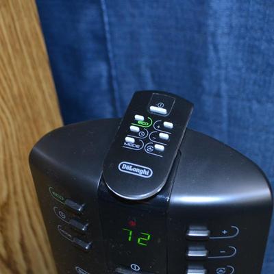 LOT 154. DELONGHI HEATER WITH REMOTE
