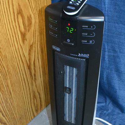 LOT 154. DELONGHI HEATER WITH REMOTE