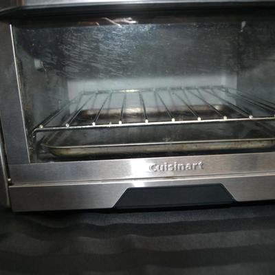 LOT 161.   CUISINART 4 SLOT TOASTER AND CUSINART TOASTER OVEN + SAUCE PAN