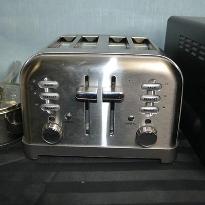 LOT 161.   CUISINART 4 SLOT TOASTER AND CUSINART TOASTER OVEN + SAUCE PAN