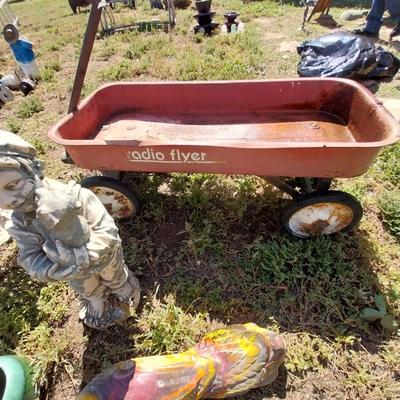 RADIO FLYER WAGON AND A COLLECTION OF YARD ART