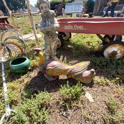 RADIO FLYER WAGON AND A COLLECTION OF YARD ART