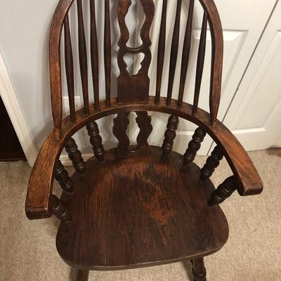 Heavy solid oak extra wide bow back chair.