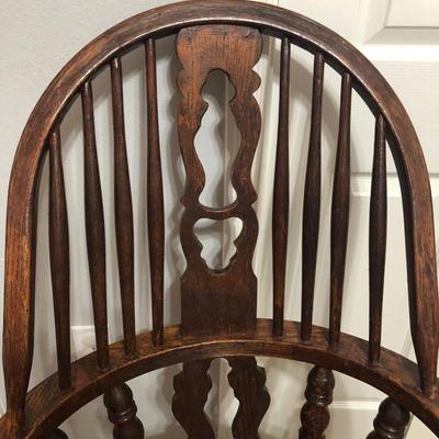 Heavy solid oak extra wide bow back chair.