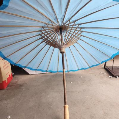 Umbrellas and umbrella holder