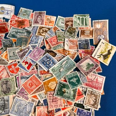 ASSORTMENT OF VINTAGE WORLDWIDE POSTAGE STAMPS