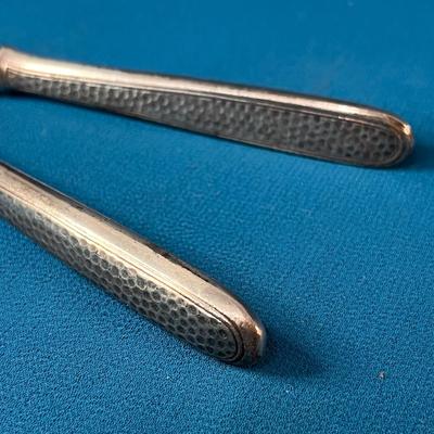 VINTAGE WELL-USED METAL NUTCRACKER TEXTURED HANDLE