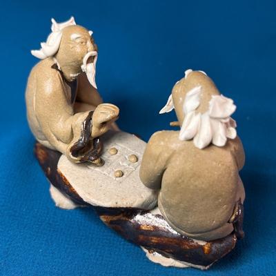 MUD MEN GAME PLAYERS