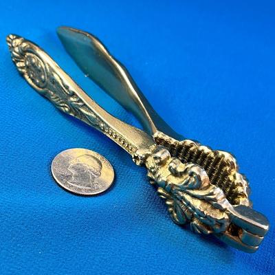FANCY ORNATE GOLD TONE METAL NUT CRACKER