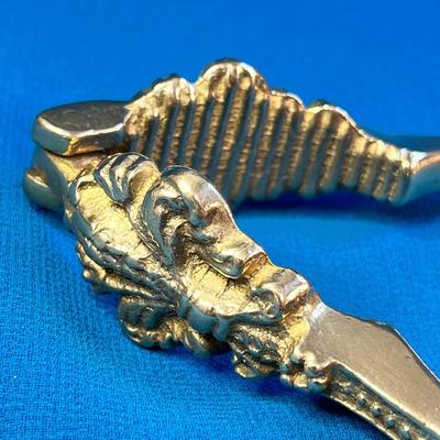 FANCY ORNATE GOLD TONE METAL NUT CRACKER