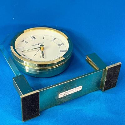 ELEGANT HOWARD MILLER BRASS AND GLASS SHELF CLOCK