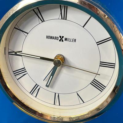 ELEGANT HOWARD MILLER BRASS AND GLASS SHELF CLOCK