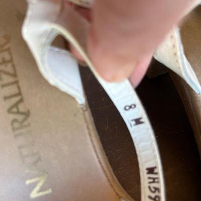 2 pairs of white shoes