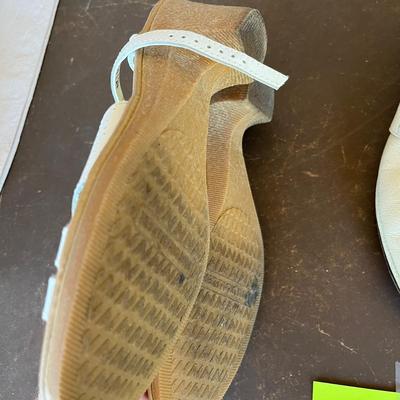 2 pairs of white shoes