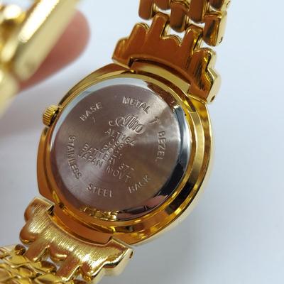 Two Gold Tone Quartz Watches by Peck & Peck and Alto (B5-BBL)