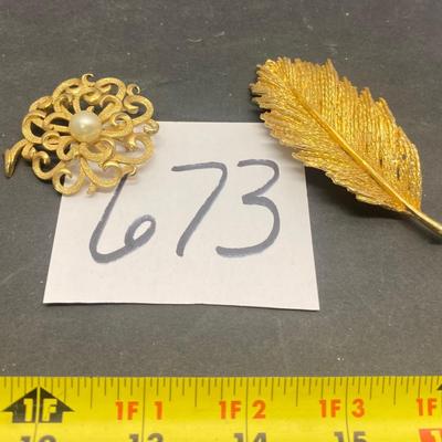 Golden Brooches