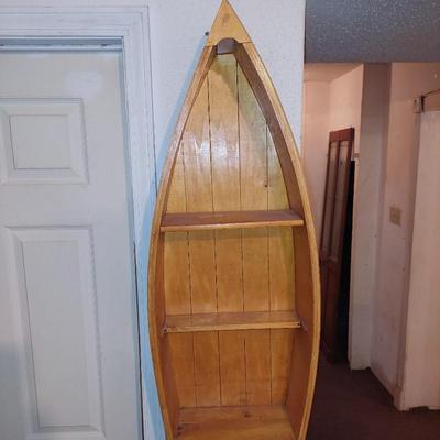 Wooden canoe wall shelf