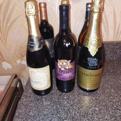 Saints & LSU Collectable wine bottle lot