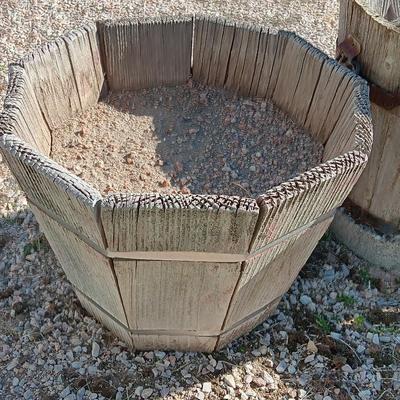 THREE WOODEN PLANTER BARRELS