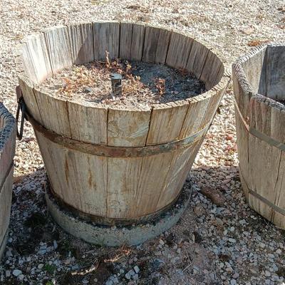 THREE WOODEN PLANTER BARRELS