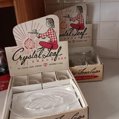 TWO VINTAGE CRYSTAL LEAF SNACK PLATES WITH MUGS
