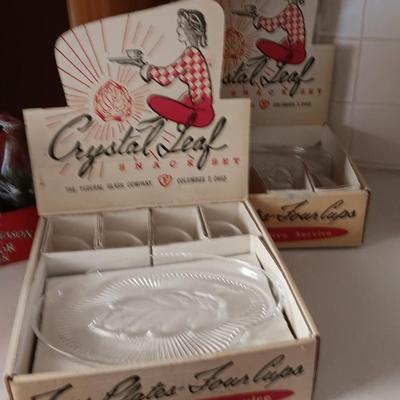 TWO VINTAGE CRYSTAL LEAF SNACK PLATES WITH MUGS