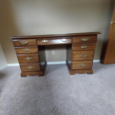WOODEN SEVEN DRAWER DESK AND WOODEN CHAIR
